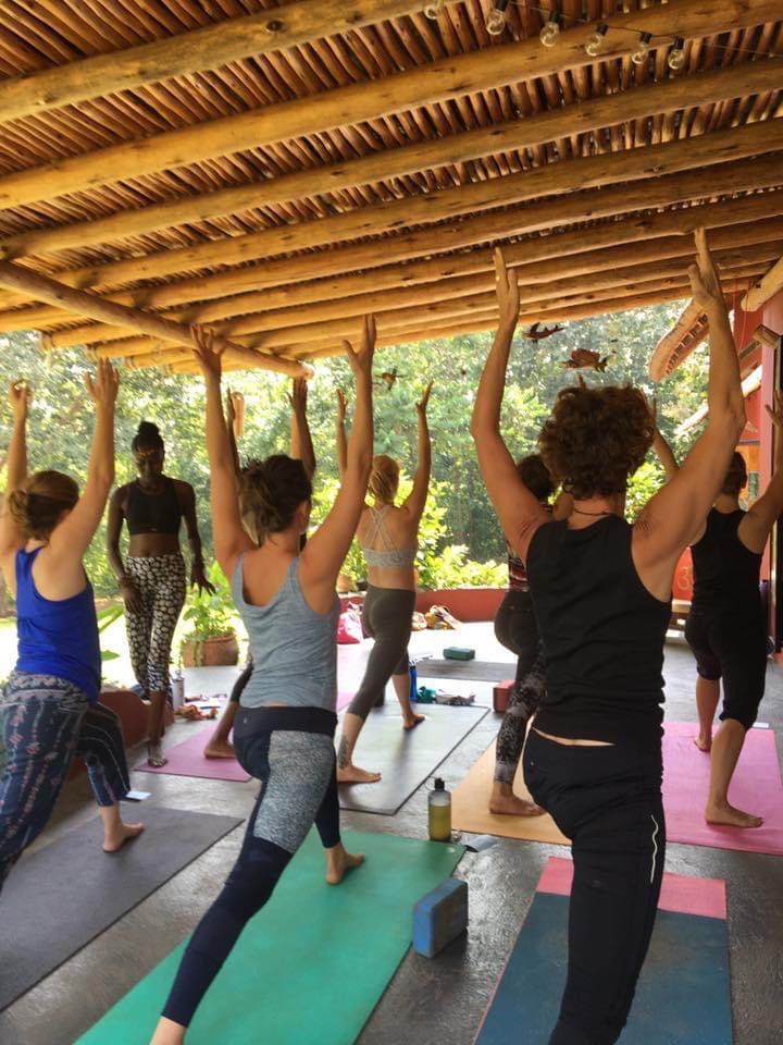 event: Stellah Patience: leading a class at a past retreat.  IG @poweryogajinja - Self-Care Retreat: Yoga Meditation Pilates Nutrition 